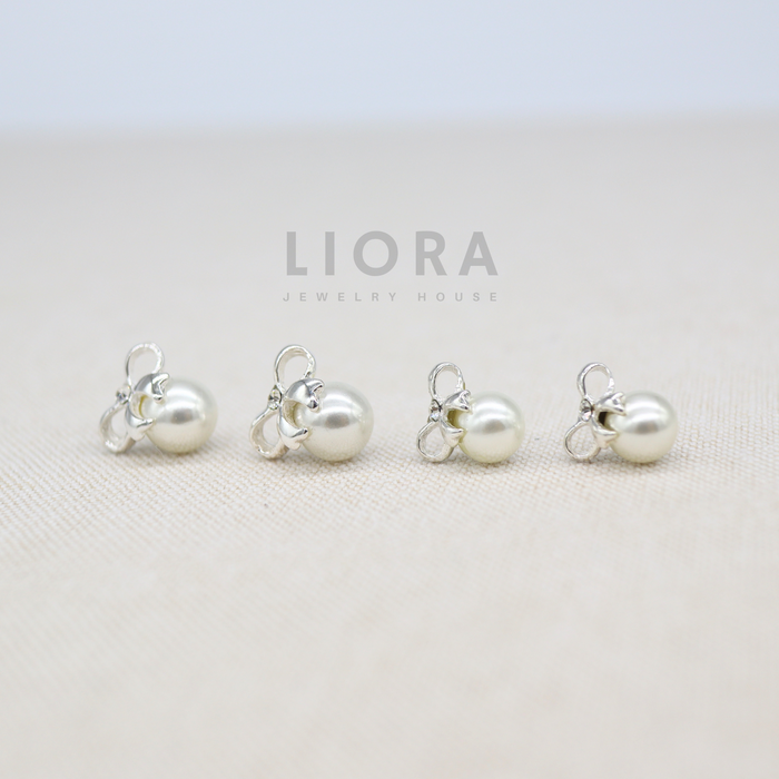 Pearl with Bow Stud Earrings